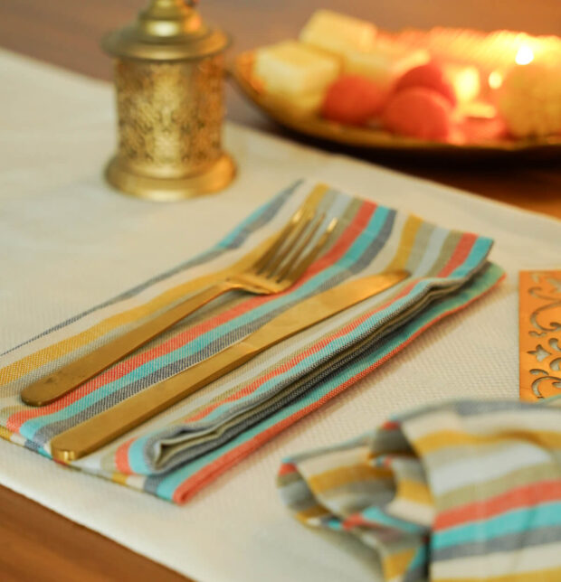 Kadoor Pristine White Table Runner & Multicolor Fiesta Napkin Set - Gift Bag