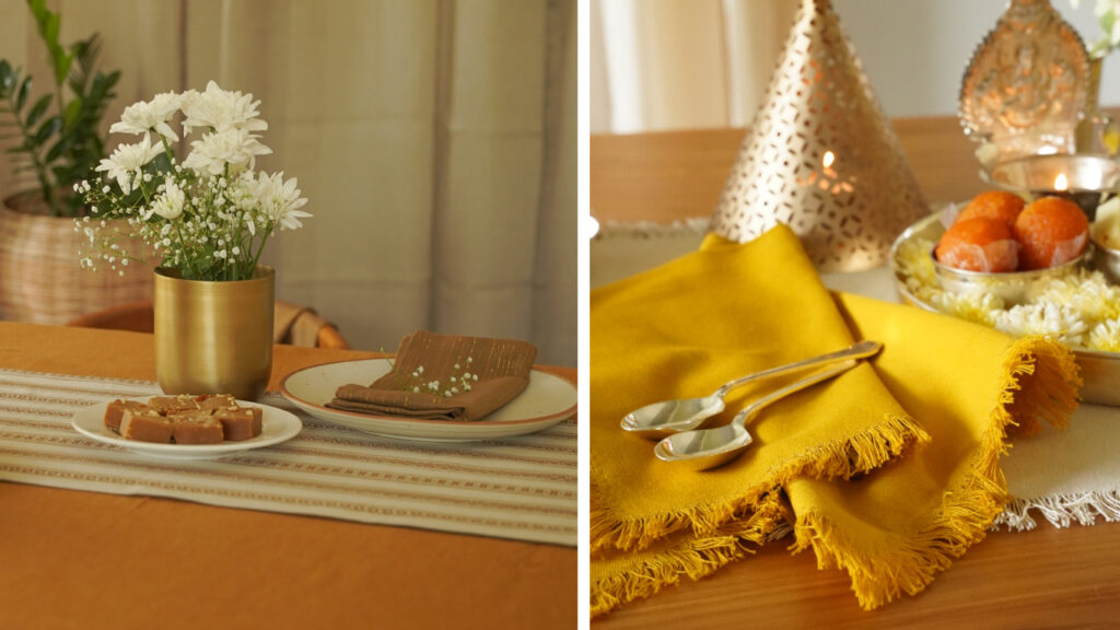 Diwali dining table with a striped cotton table runner, mustard napkins, brass decor and sweets